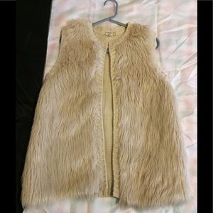 Eyeshadow fur vest